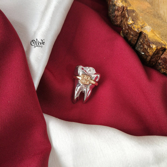 Tooth Brooch