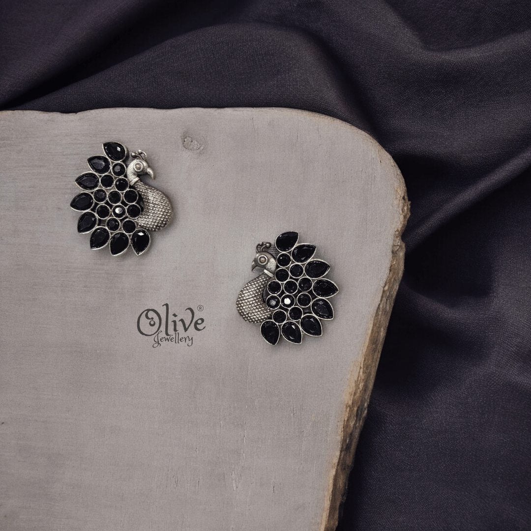 The Silver Peacock Studs