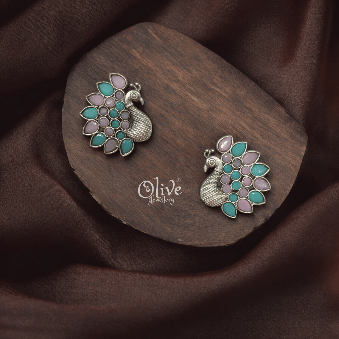 The Silver Peacock Studs